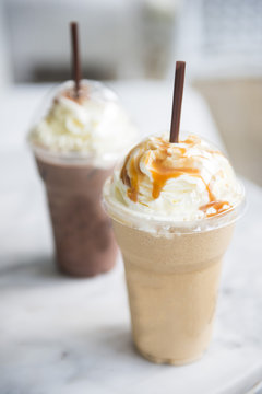 ice chocolate and caramel frappe in the takeaway plastic cup
