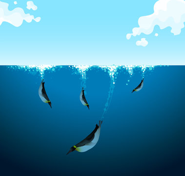 Penguins Swimming Under The Ocean