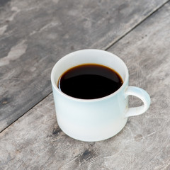 Coffee cup on old table