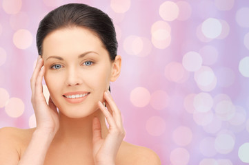 Naklejka premium beautiful young woman face