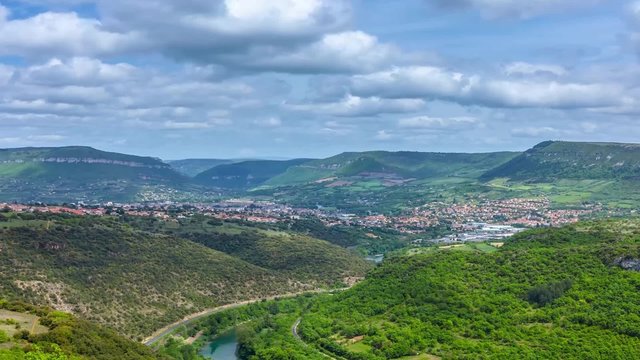 Timelapse of clouds passing over the valley of river Tarn in the vicinity of the Viaduct Millau in Midi Pyrenees, France.