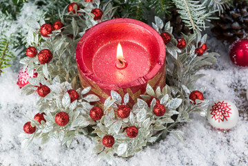 Christmas ornaments in snow.
