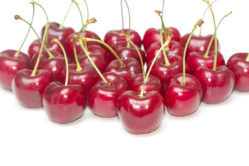 Sweet ripe cherry on white background