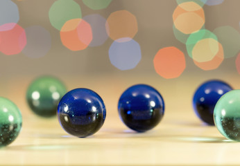 Glass balls on the background bokeh. Texture of colorful balloons. 
