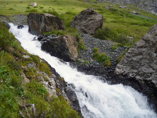 wild mountain stream in a steep slope