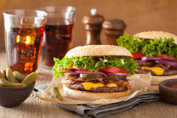 bacon cheese burger with pickles tomato onion