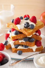 french toasts with creme fraiche and berries for breakfast