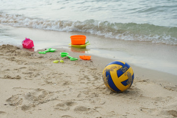 Football and children's beach toys