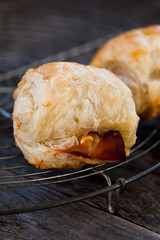 Pastry rolls with bacon and cheese