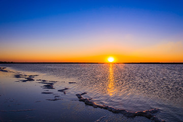 Fototapeta na wymiar Sunrise on the lake Baskunchak.