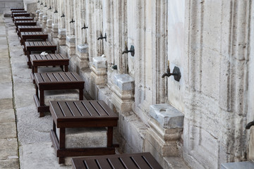 Seats and water, preparations before prayer at a mosque, Istanbul, Turkey