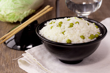 Bowl with rice and green peas