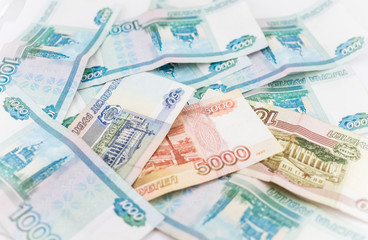 Obraz na płótnie Canvas Russian money background. Ruble banknotes of different denominations