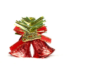 Christmas bells on white background, right hand space