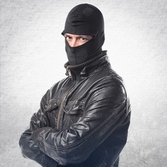 Robber with his arms crossed