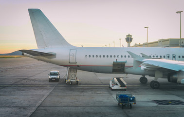 Obraz premium Passenger plane in the airport. Aircraft maintenance.