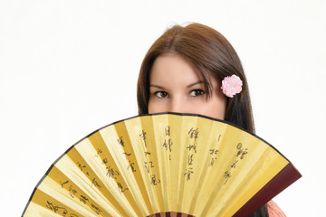 a woman folding fan