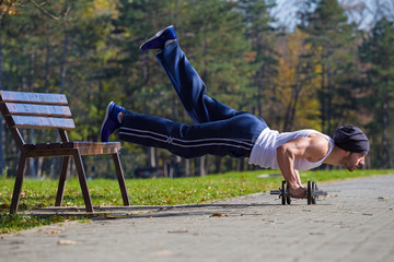 one leg push ups in nature