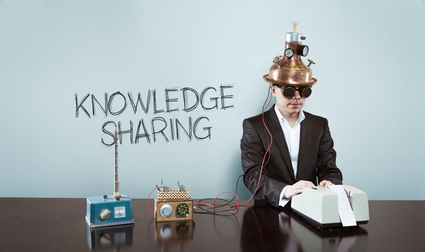 Knowledge is sharing concept with vintage businessman and calculator