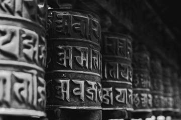 prayer wheels at Swayambhunath, Nepal, monochrome - 98107634