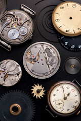 antique pocket watch, gears and mechanisms