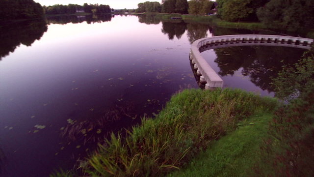 A big lake in the middle of the forest in Rapina Estonia. There is a white stones in the middle of the lake