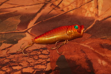 spinners lure on the camouflage background