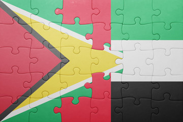 puzzle with the national flag of united arab emirates and guyana