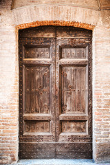 Fototapeta na wymiar Background door from iltalian streets in Tuscany