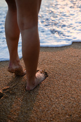 Sexy Legs on Tropical Sand Beach. Walking Female Feet. Closeup