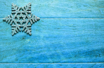 Rustic, wintry background in blue; perfect for announcement or invitation
