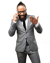 business black man talking on a mobile