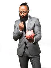 business black man saving with a piggy bank