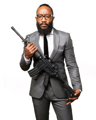 Fototapeta na wymiar business black man holding a machine gun