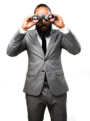 business black man holding binoculars