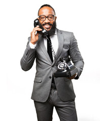 Fototapeta premium business black man holding a telephone
