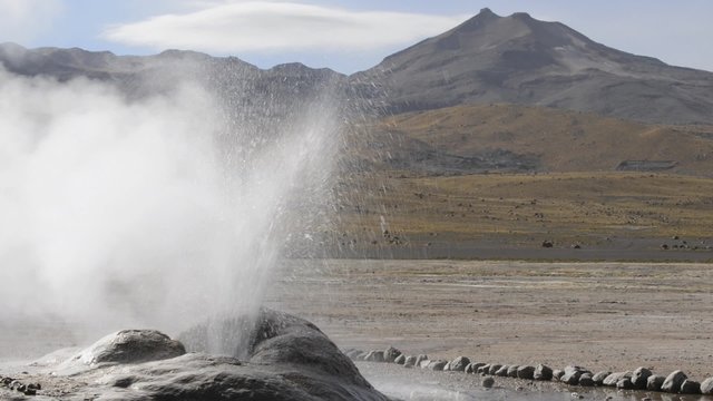 Erupting geyser at the El Tatio Geyser valley in San Pedro de Atacama, Chile. El Tatio geysers located at 4320 meters above sea level are one of the major tourist attraction in Chile.
