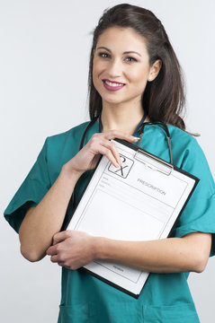 doctor holding a medical prescription clip