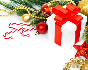 christmas gift with red balls bow