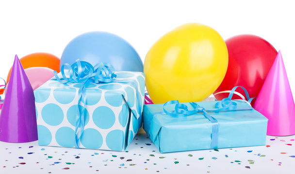 Blue Birthday Presents With Party Decorations On A White Background