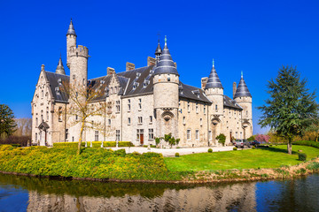 Fototapeta premium Belgium Bornem Marnix castle panorama with river riflection, Flanders historic gothic chateau scenery no people