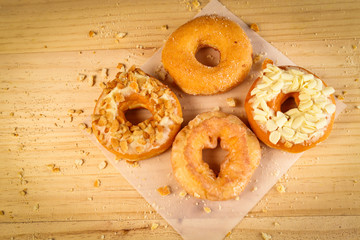 Donuts on wooden background