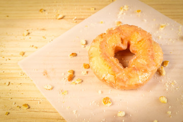 Donuts on wooden background
