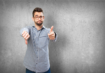 man doing a contradictory gesture