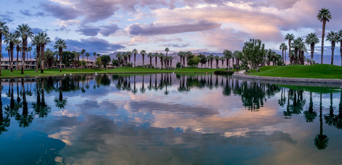 Golf course and water feature in Palm Desert California at sunrise. 