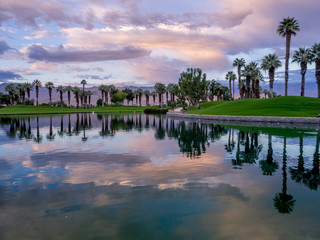 Golf course and water feature in Palm Desert California at sunrise. 