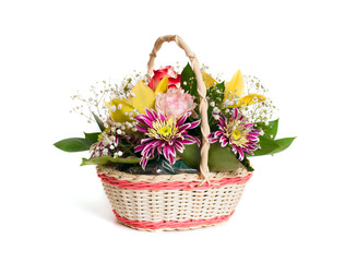 Fototapeta na wymiar a beautiful bouquet of flowers in a wicker basket isolated on white background