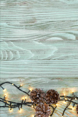 Christmas fir tree with snow on rustic wooden board with copy