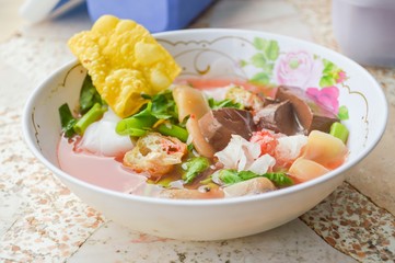 pink seafood flat noodles Yen ta fo - Thailand healthy food