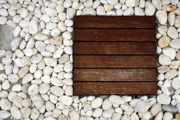 Wood tile and white pebbles